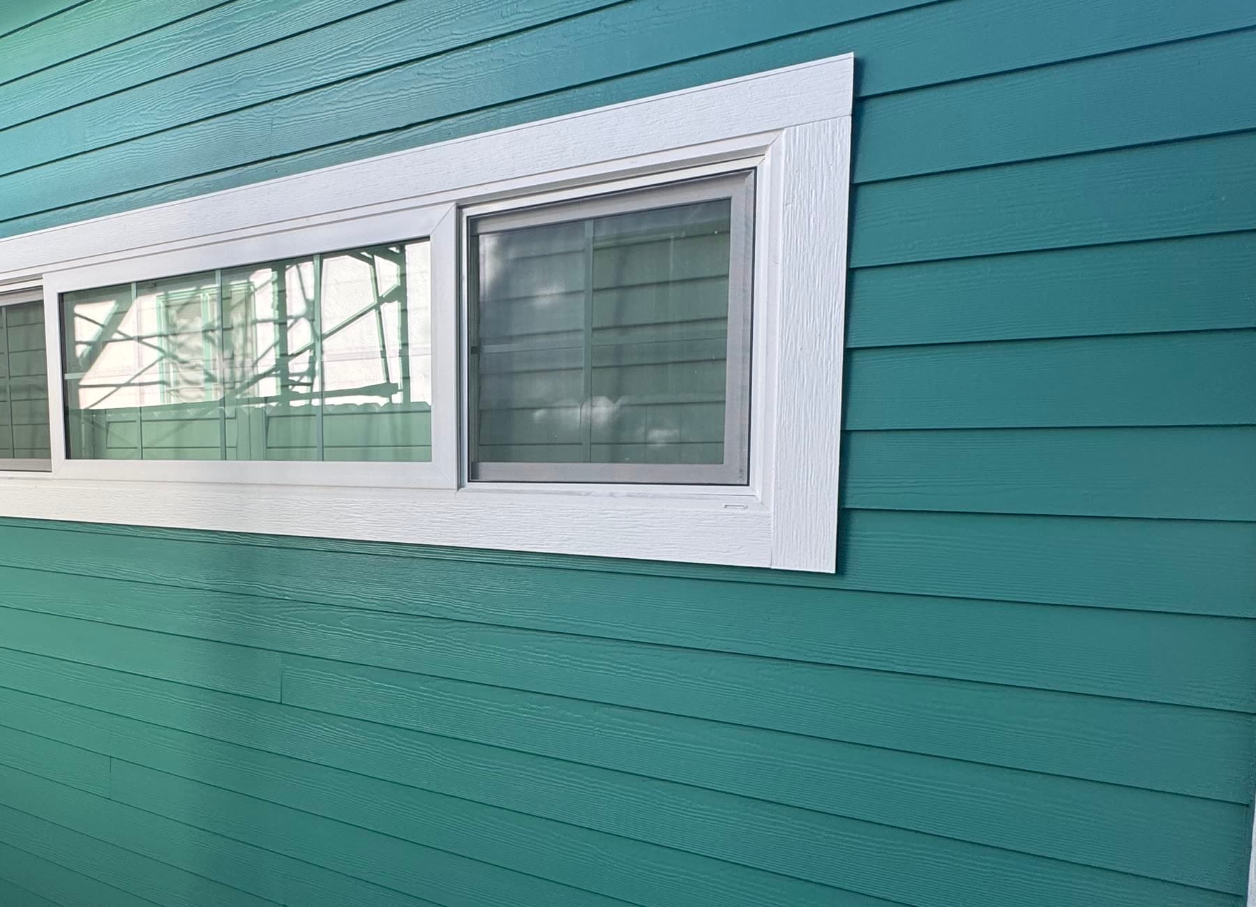 Rotted Sheathing and Old Wood Siding Replaced
