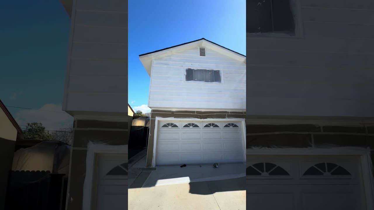 Priming repaired trim and fascia boards with Sherwin-Williams primer on a Culver City home - new wood must be primed before the Emerald topcoat goes on.