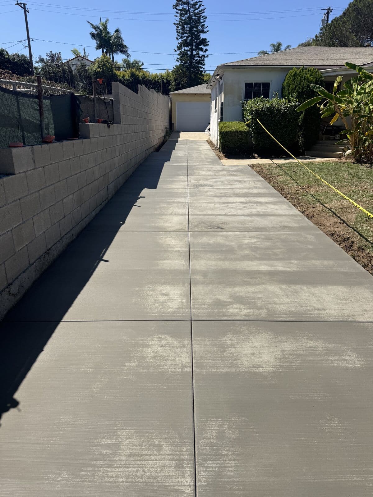 Finished 70 foot concrete driveway with a broom finish in Santa Monica